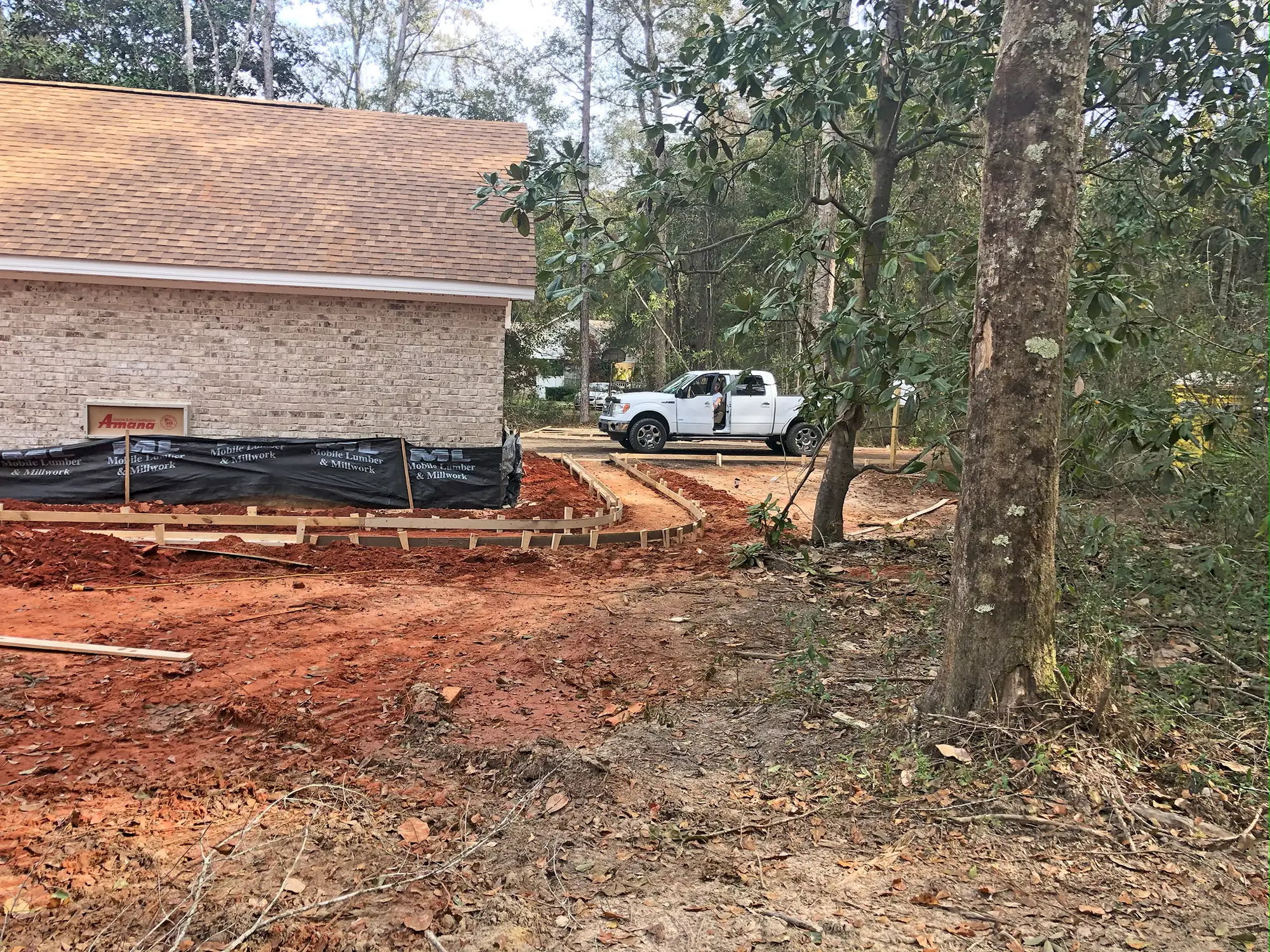 Luxury new home construction - Van Tassell project progress photo 3 by McQuillen Custom Homes in Orange Beach, AL
